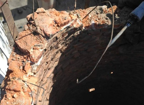 潍坊烟囱拆除施工前首先划设好安全施工区域